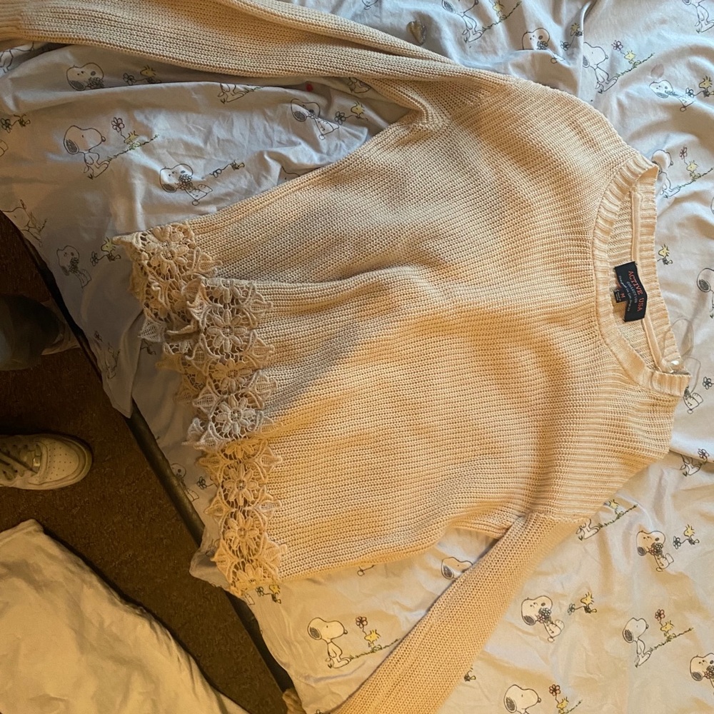 cream sweater